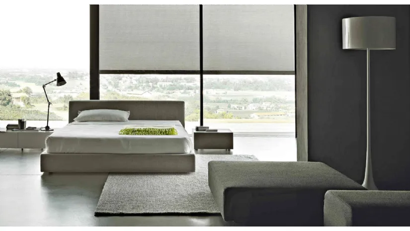 Letto dal design lineare in tessuto completamente sfoderabile con testiera Softland di Lema